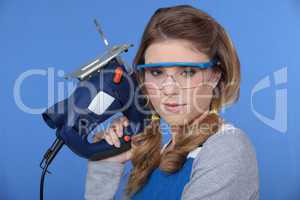 Woman with chain saw