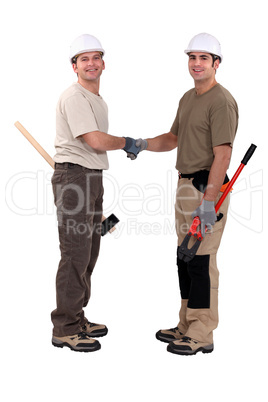 Tradesmen shaking hands