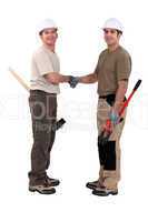 Tradesmen shaking hands