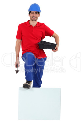 Workman with a board left blank for your message
