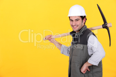 Cheerful man with a pickaxe