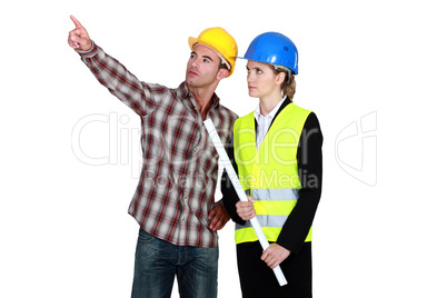 Woman with flat top, pointing to operator