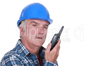 Foreman with radio receiver