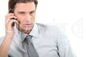 Young businessman on telephone