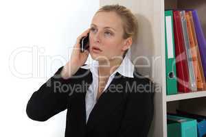 Business professional talking on her mobile phone