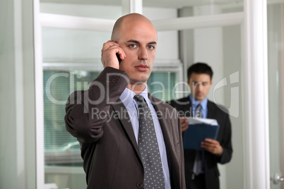 young businessman talking on his cell