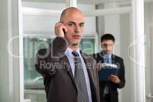 young businessman talking on his cell