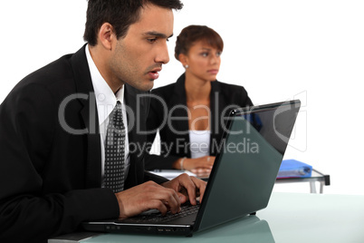 Business couple in meeting