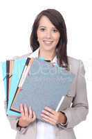 Female office worker with a pile of paperwork