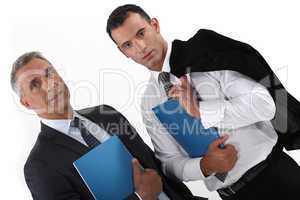 Businessmen holding folders