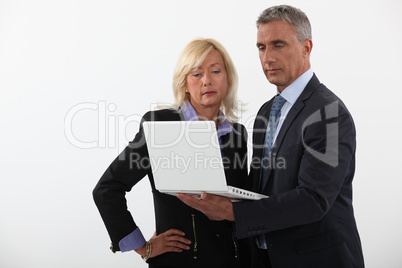 Businesspeople reading a report