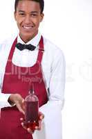 Waiter with a wine bottle
