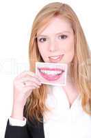 Woman holding photo of mouth