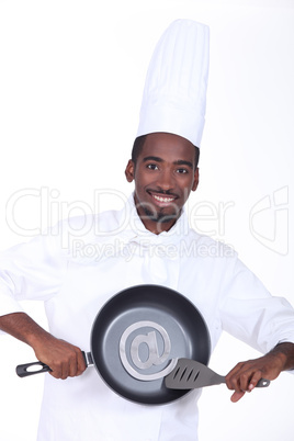 Cook holding pan with email symbol