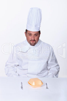 Chef sitting to eat a burger