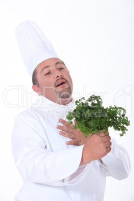 Chef loving parsley.