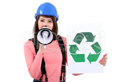 female apprentice shouting in loudspeaker shows recycling logo