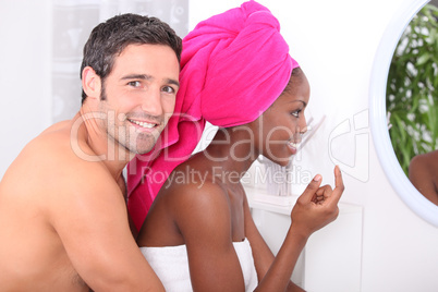 Couple using the bathroom