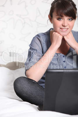 Young woman with a laptop computer