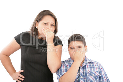 Mother and son holding their noses - bad smells in the air