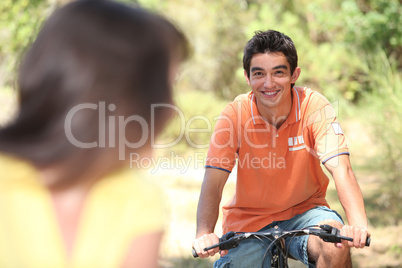 Couple riding bikes