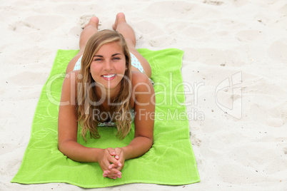 Teenage girl sunbathing