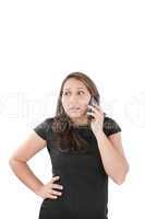 Young woman getting bad news by phone.