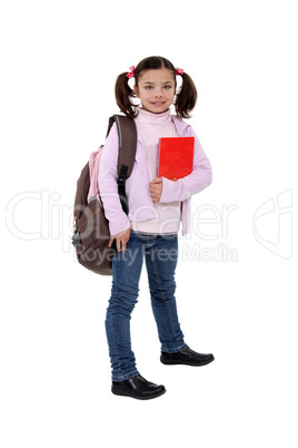 Girl with backpack and folder