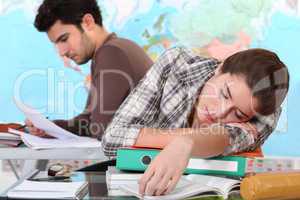 Student sleeping on her desk