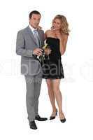 Couple with champagne bottle