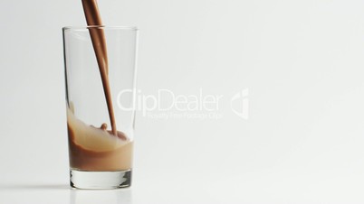 Pouring a Glass of Chocolate Milk, Slow Motion (300 fps)