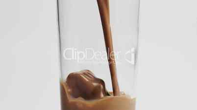 Pouring a Glass of Chocolate Milk in Slow Motion (300 fps)
