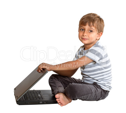 Boy with laptop isolated on white background