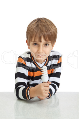 boy holding a lamp, isolated on white background