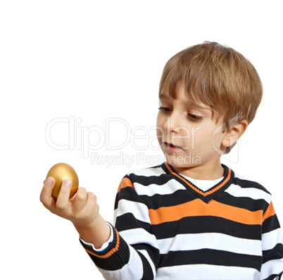 boy holding a golden egg, isolated on white background