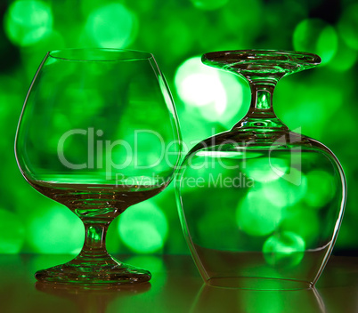 Beautiful glasses for wine against green a side