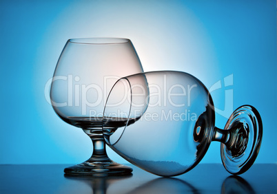 Beautiful wine glasses on a blue background