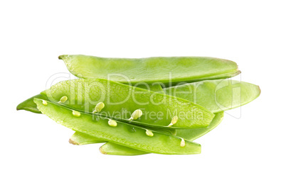 Young green peas on a white background