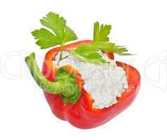 Fresh red paprika filled with salad. Isolated on a white backgro