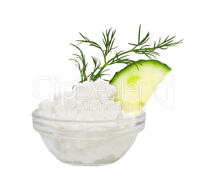 Coarse-grained cottage cheese with fennel and a cucumber. Isolat