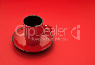 Red coffee cup on a Red background
