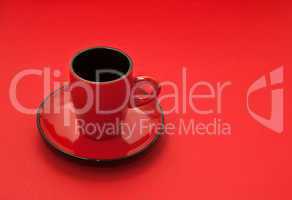 Red coffee cup on a Red background