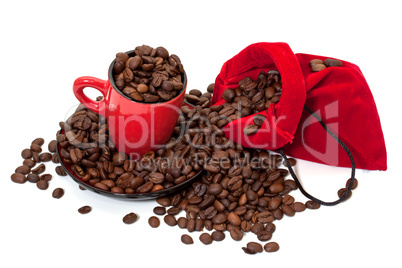 Coffee grains in a bag and in a red cup