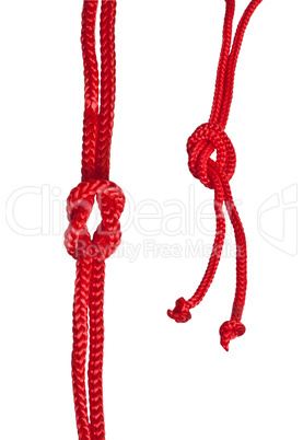 Red rope with knot isolated on a white background
