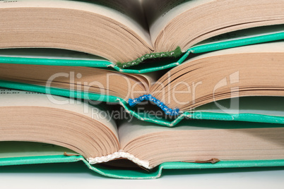 Stack of books in hardcover in close-up