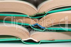 Stack of books in hardcover in close-up