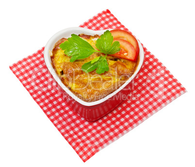 Meat baked in a pot on a white background