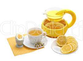 Tea with lemon  on a white background