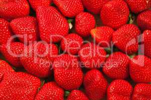 Ripe and fresh strawberries background closeup