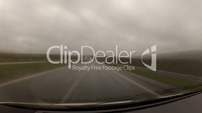 timelapse driving a car in the rain.